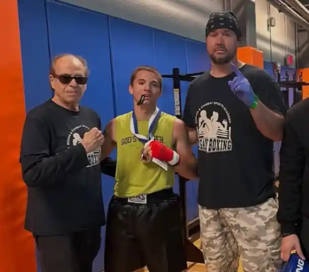 Kid boxer winning a competition