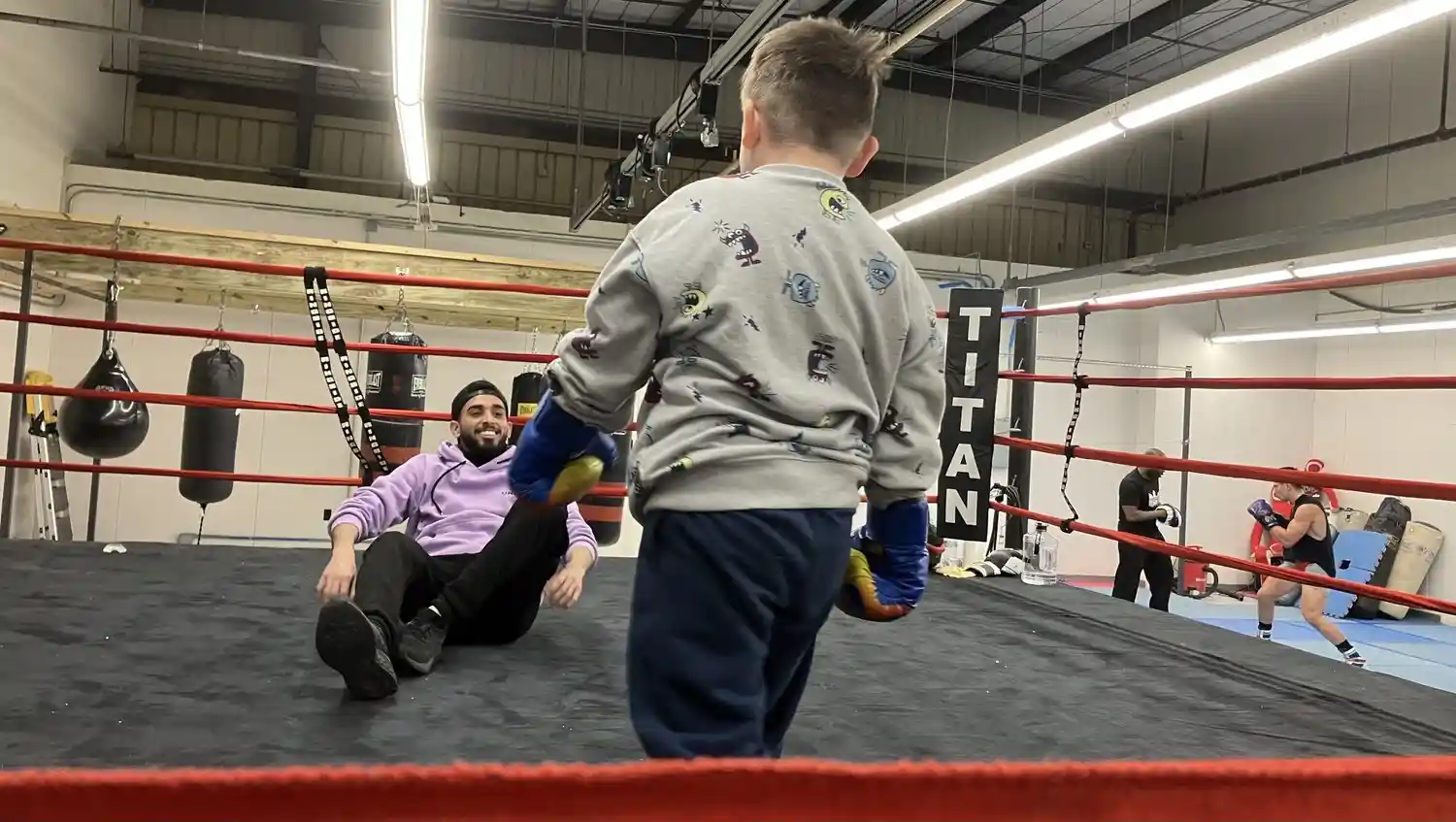 One of our youth boxers winning a fight